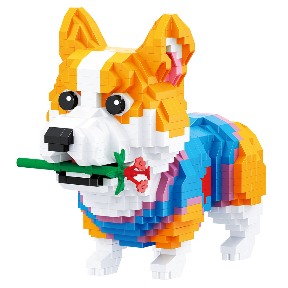 Produktfoto der Balody Miniblocks Corgi im Pullover mit einer Blume im Maul
