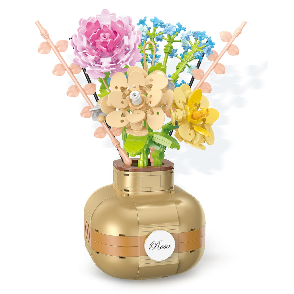 Produktfoto der Balody Miniblocks goldfarbene Vase mit Blumen