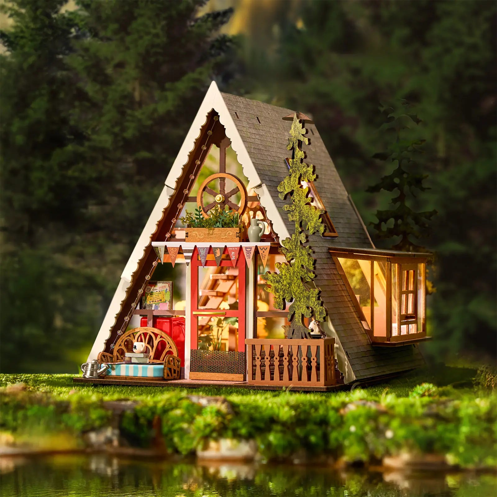Atmosphärische Präsentation der Robotime A-Frame Cabin, Miniatur-Ferienhaus im winterlichen österreichischen Stil