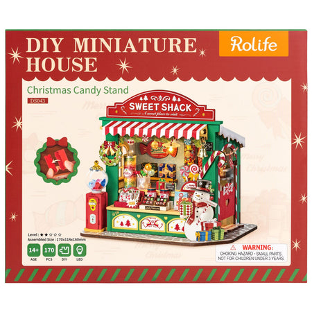 Vorderseite der Verpackung der Robotime Christmas Candy Stand, Bausatz für einen Miniatur-Süßigkeitenstand im Weihnachtsdesign