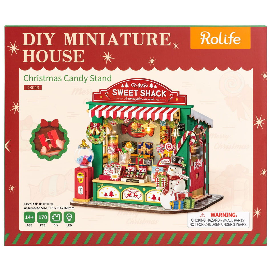 Vorderseite der Verpackung der Robotime Christmas Candy Stand, Bausatz für einen Miniatur-Süßigkeitenstand im Weihnachtsdesign