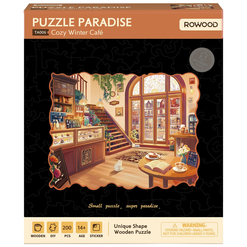 Vorderseite der Verpackung der Robotime Cozy Winter Café, Holzpuzzle eines Wintercafés mit ungewöhnlichen Teilen