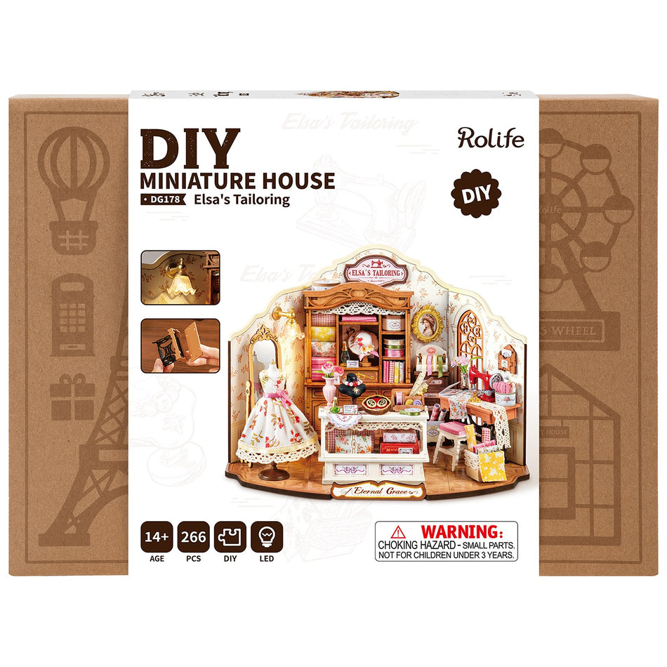 Vorderseite der Verpackung der Robotime Elsa’s Tailoring, DIY Miniaturhaus eines niedlichen Nähateliers