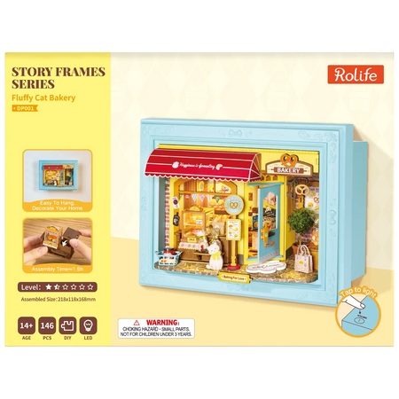Vorderseite der Verpackung der Robotime Fluffy Cat Bakery, Diorama in einem Rahmen, das eine Bäckerei mit einer Katze zeigt