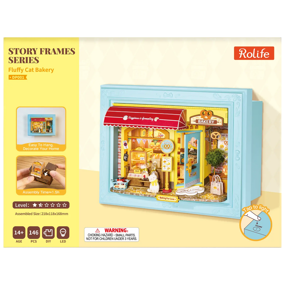 Vorderseite der Verpackung der Robotime Fluffy Cat Bakery, Diorama in einem Rahmen, das eine Bäckerei mit einer Katze zeigt
