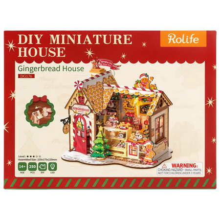 Vorderseite der Verpackung der Robotime Gingerbread House, Miniaturhaus eines Lebkuchenhauses in weihnachtlicher Atmosphäre