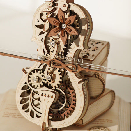 Der Resonanzkörper mit beweglichen Zahnrädern und Bogen des Robotime Magic Cello