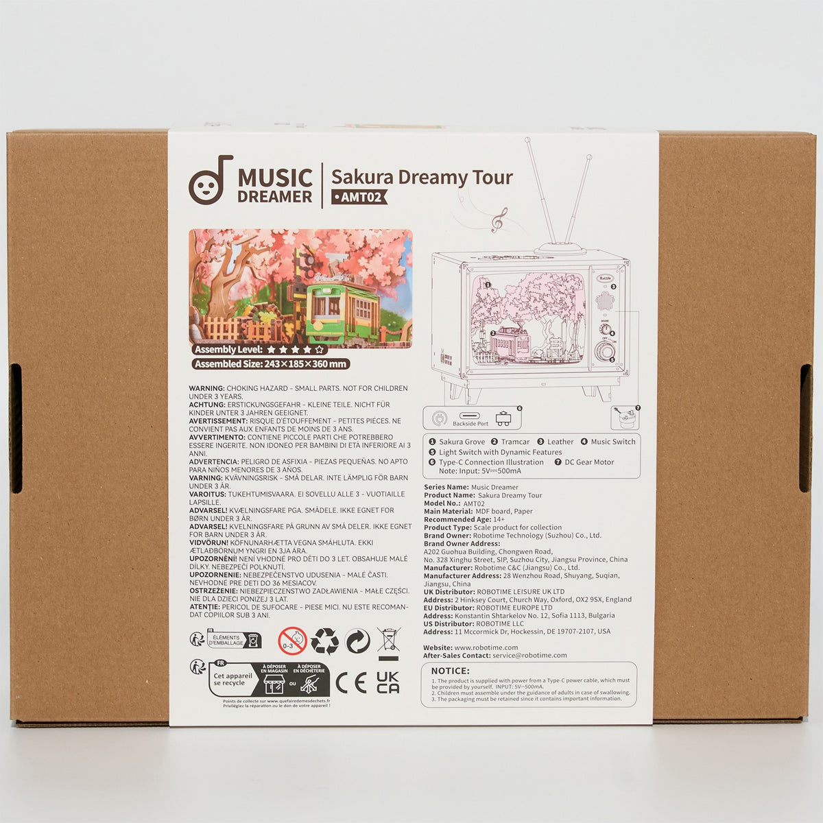 Rückseite der Verpackung der Robotime Sakura Dreamy Tour, Holzbausatz eines Fernsehgeräts mit einer herumfahrenden Straßenbahn