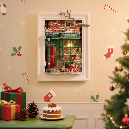 Atmosphärische Präsentation der Robotime Santa’s Toy Shop, Diorama eines weihnachtlich dekorierten Ladens mit Lichtern