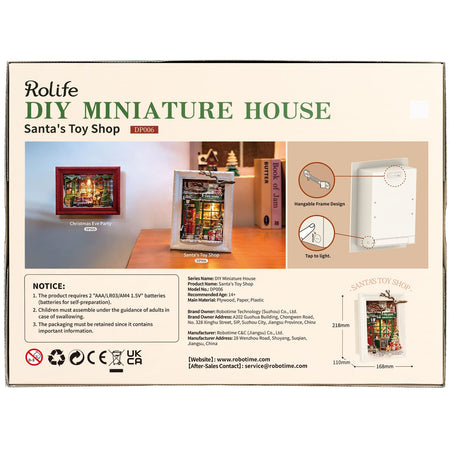 Rückseite der Verpackung der Robotime Santa’s Toy Shop, Diorama eines weihnachtlich dekorierten Ladens mit Lichtern