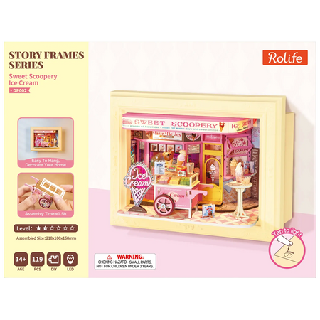 Vorderseite der Verpackung der Robotime Sweet Scoopery Ice Cream, Diorama in einem Rahmen eines Eiswagens vor einer niedlichen Eisdiele 