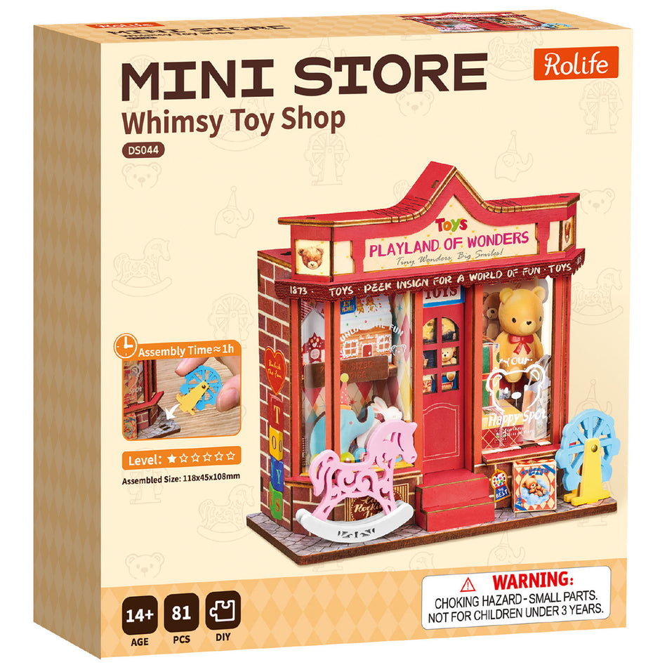 Vorderseite der Verpackung der Robotime Whimsy Toy Shop, Bausatz für ein Miniaturhaus eines Spielzeugladens mit altmodischem Spielzeug